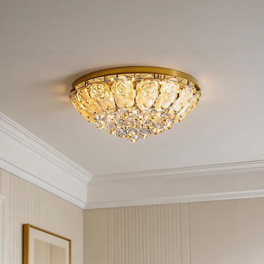 Elegant crystal ceiling lights flush mount with a gold base and a warm faceted crystal bowl.