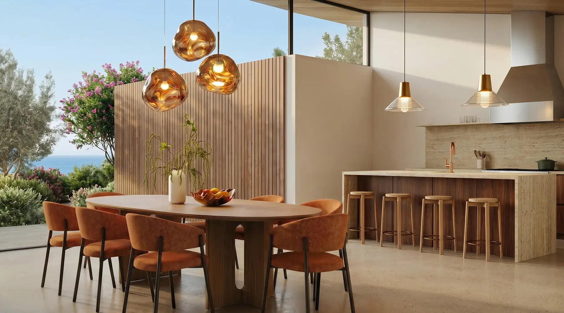 Amber glass globe pendant lights above a dining table in a modern open-plan kitchen