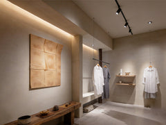 The lighting design in modern clothing retail stores is soft and clear.