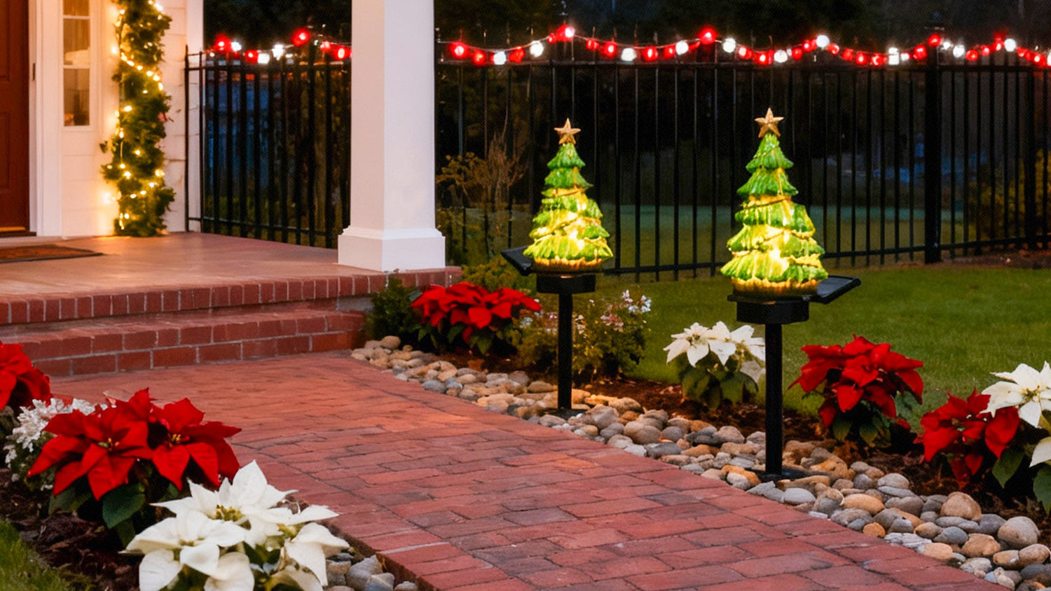 Resin Solar LED Christmas Tree Lights lining walkway.