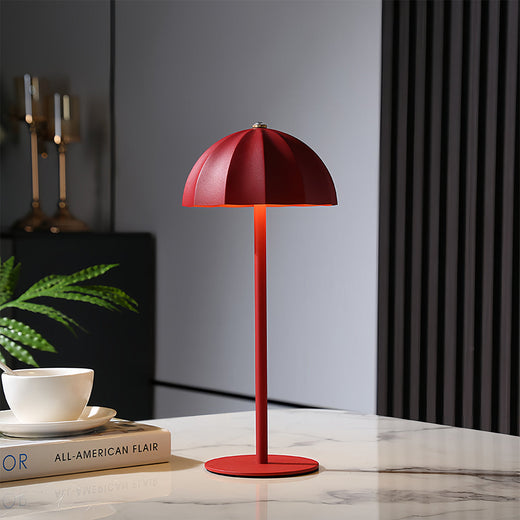 Vibrant red iron table lamps providing task lighting in stylish contemporary interior