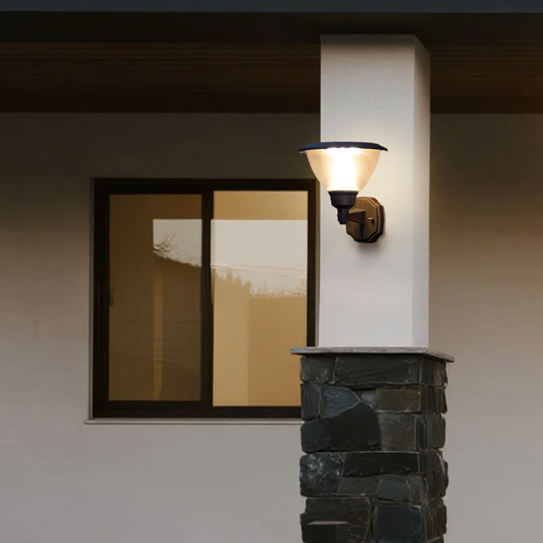 Warm LED wall light illuminating textured brick surface creating dramatic architectural lighting effects