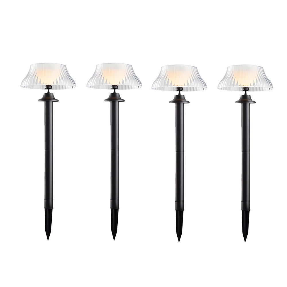 Set of fiour matching solar garden lights with decorative glass tops and ground spike bases