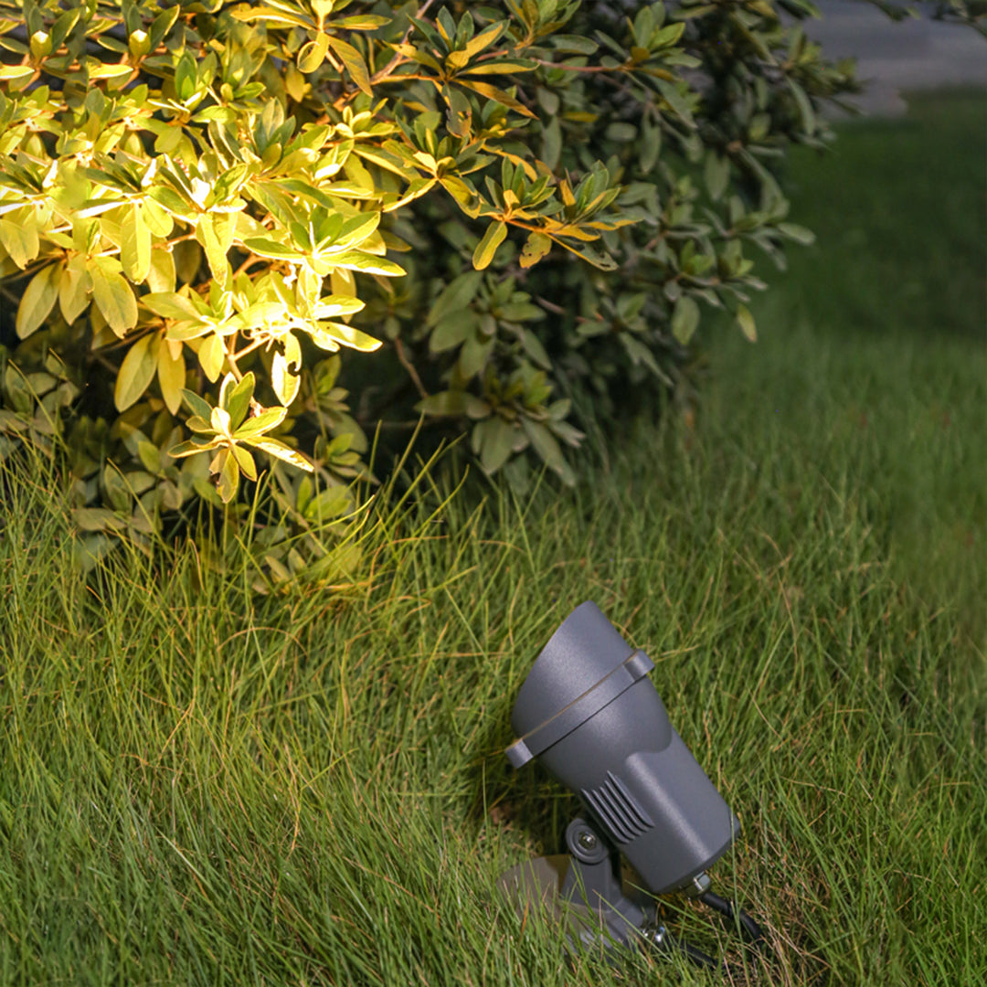 Traditional stone building with classic outdoor wall lantern providing warm welcoming illumination