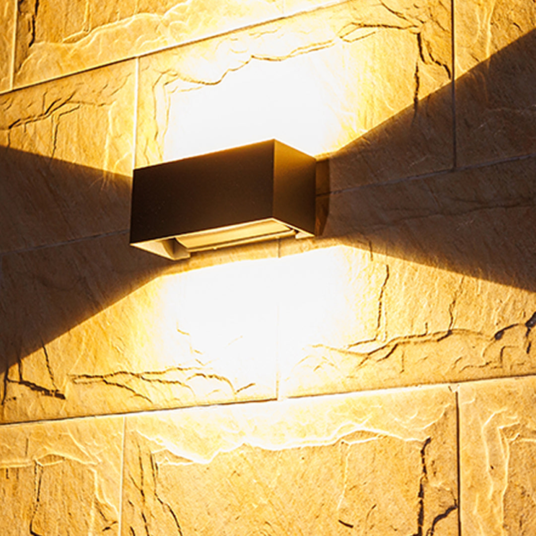 Technical specification drawing showing dimensions and installation details for wall light