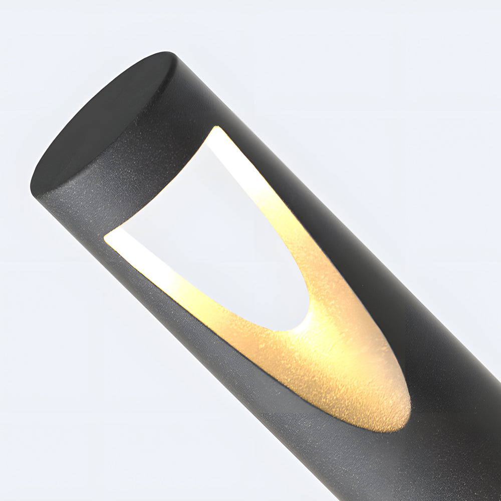 Close-up detail of bollard light showing internal LED illumination and oval aperture design