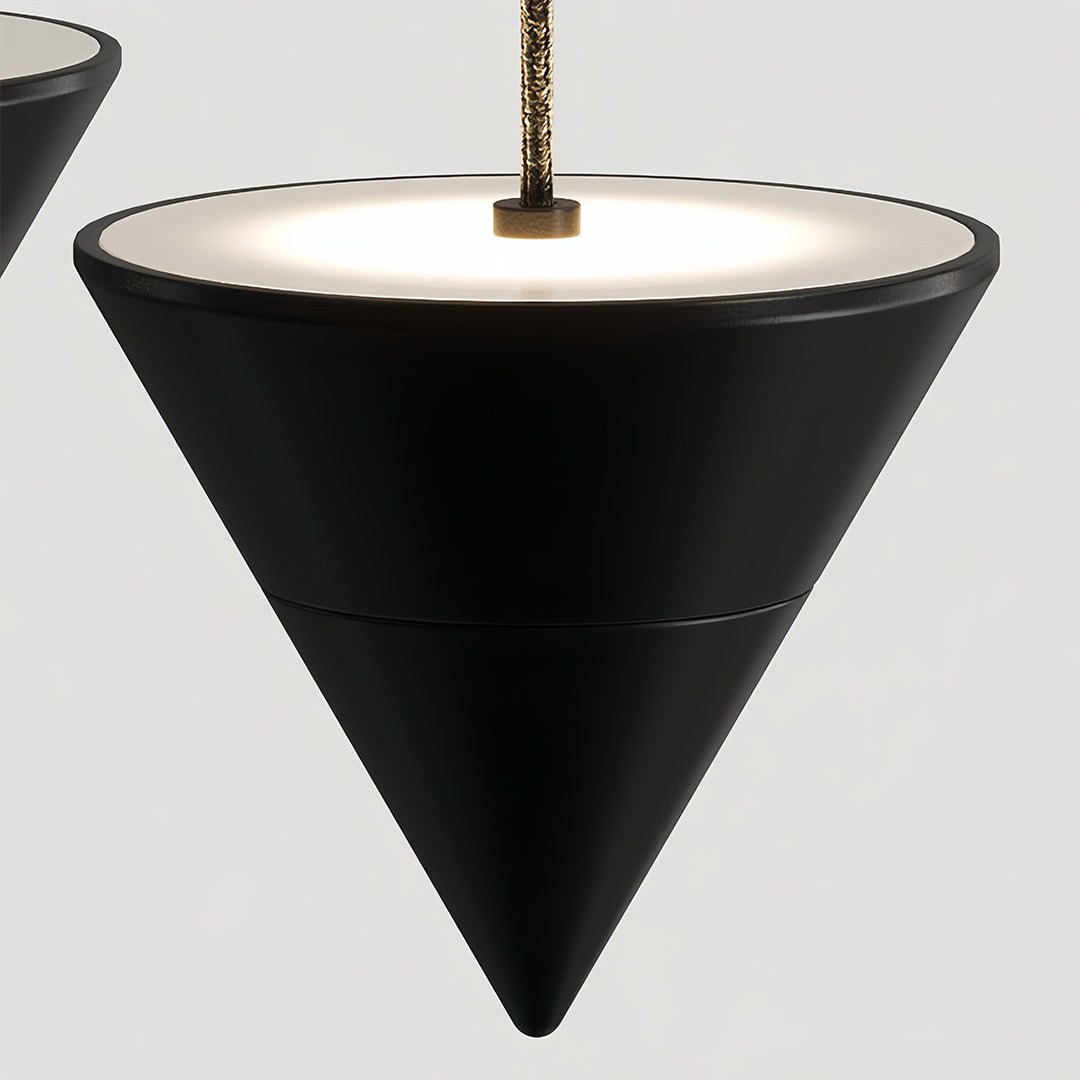Close-up detail of 1 light pendant showing black conical shade with premium finish and craftsmanship