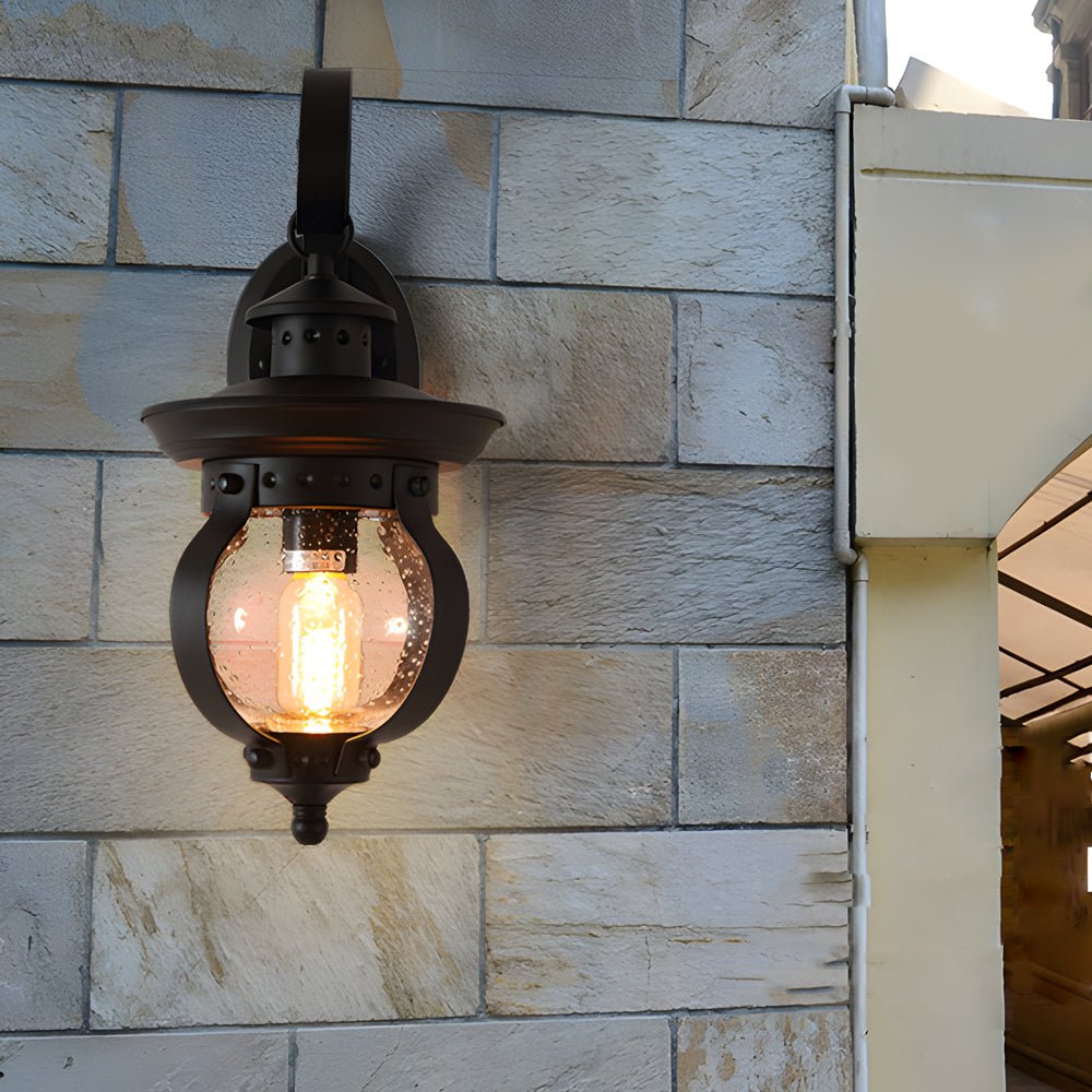 1 - Light Seeded Glass Globe LED Outdoor Wall Lantern with Curved Arm