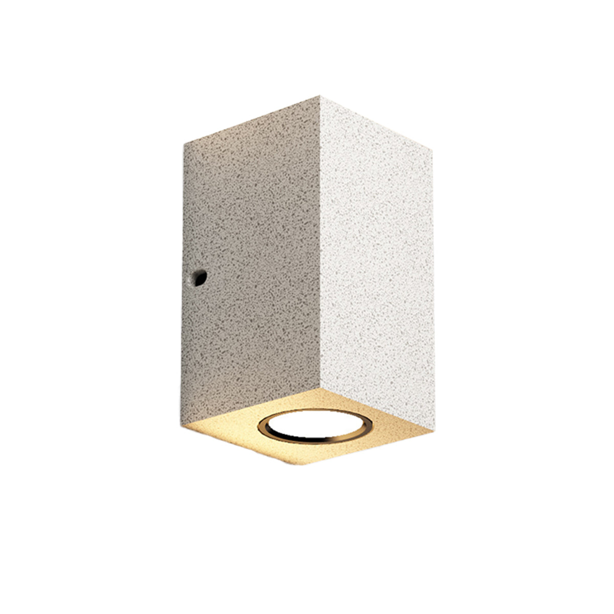 Cubic concrete light fixture with warm LED creating dramatic shadow and light interplay