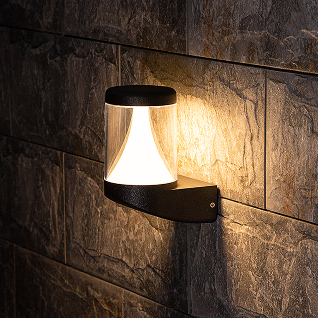 Modern black curved outdoor wall light with integrated LED and sleek geometric design