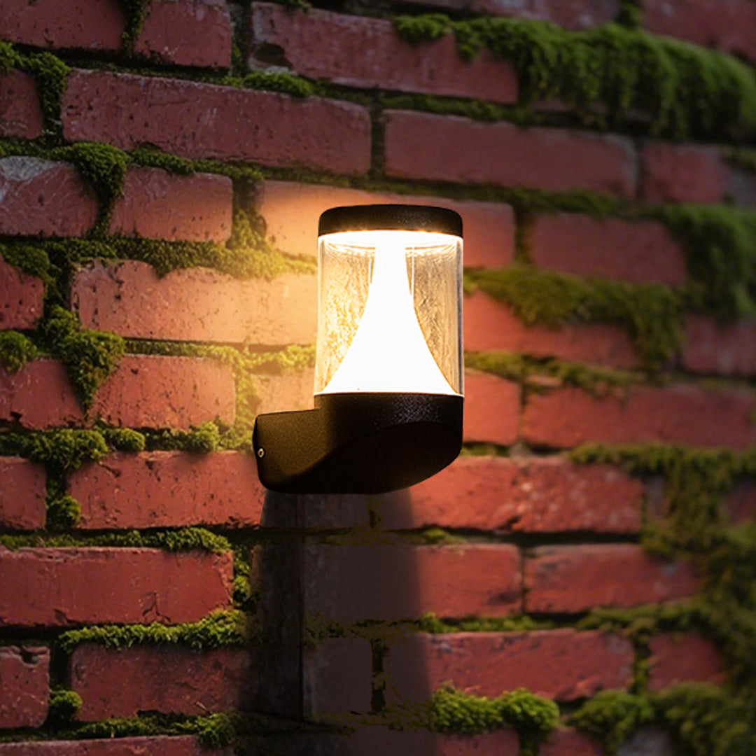 Round black recessed light fixture with visible LED module and chrome accents