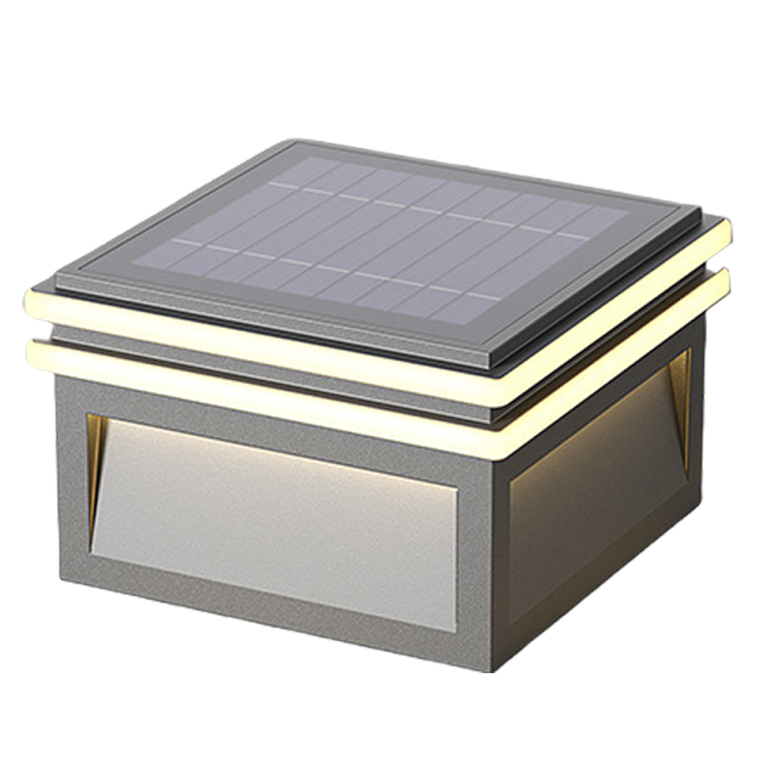 Modern cubic wall-mounted light fixtures creating dramatic architectural illumination on contemporary building facade at night