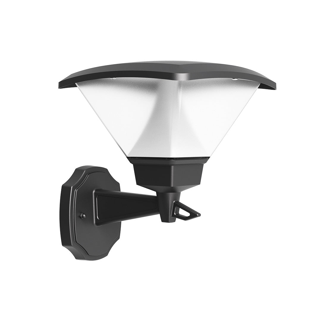 Elegant residential entrance featuring warm outdoor lighting and Mediterranean-style architectural details