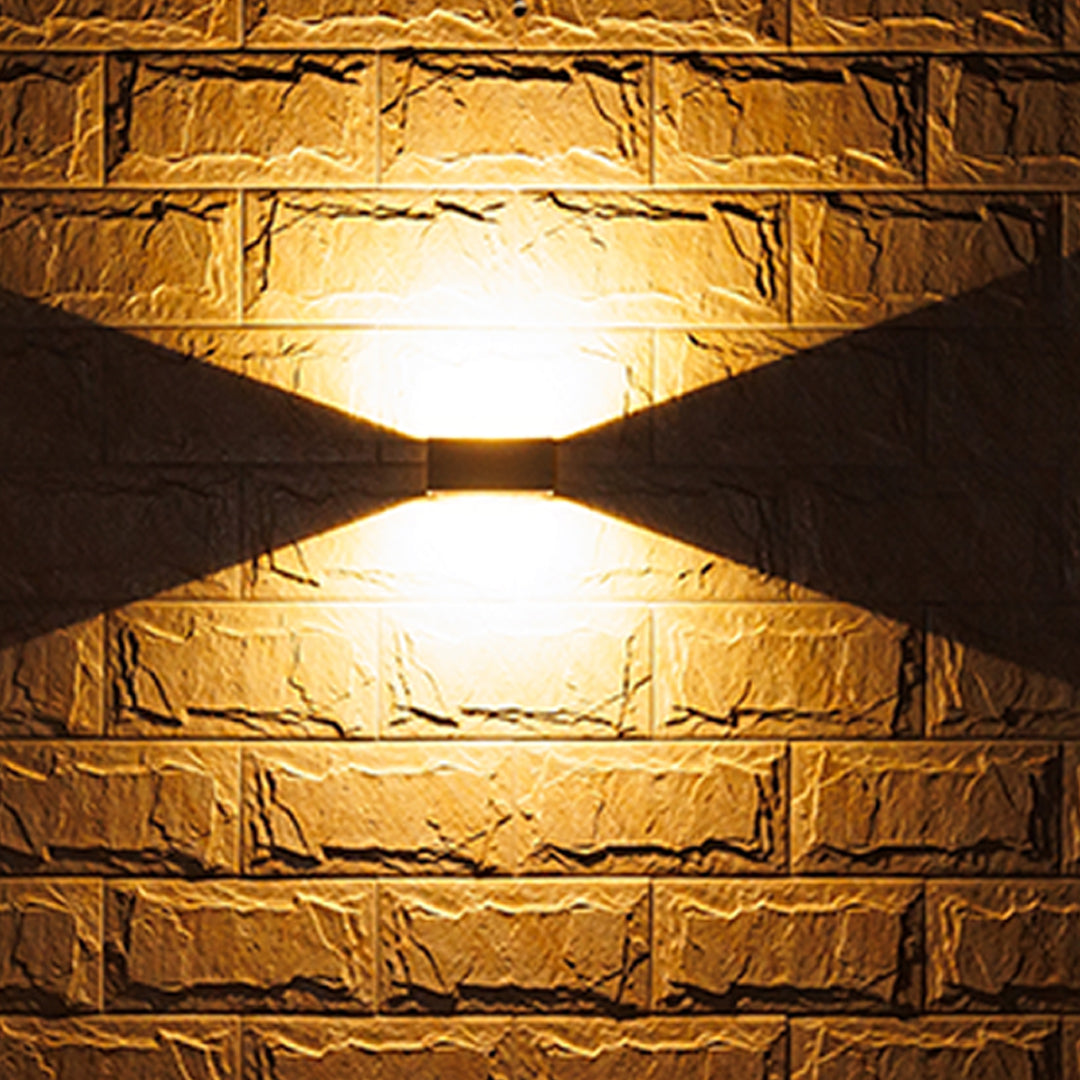 Modern black rectangular LED wall light with integrated sensor and sleek minimalist design