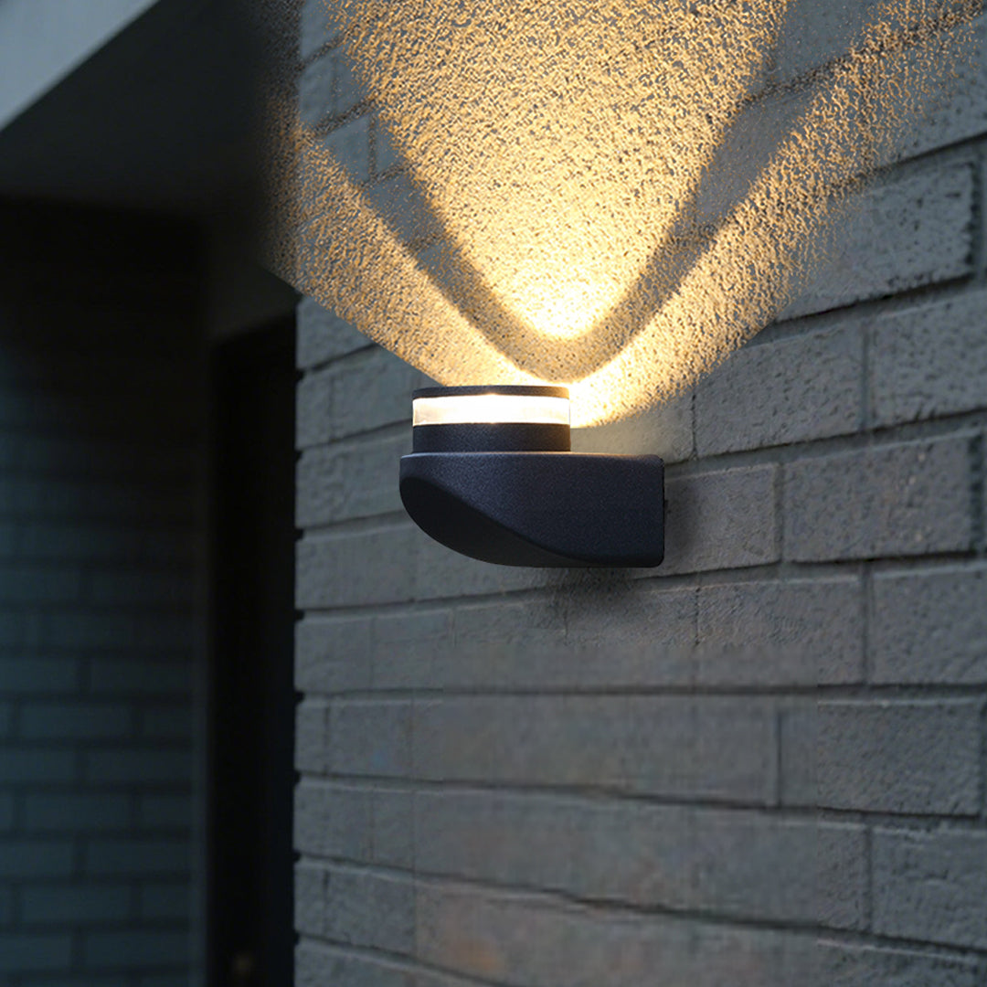 Sleek black angular wall light fixture with modern minimalist aesthetic