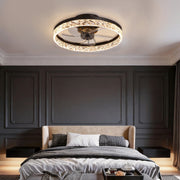 5-blade fan light installed in a modern dark-toned bedroom with ambient ceiling lighting.
