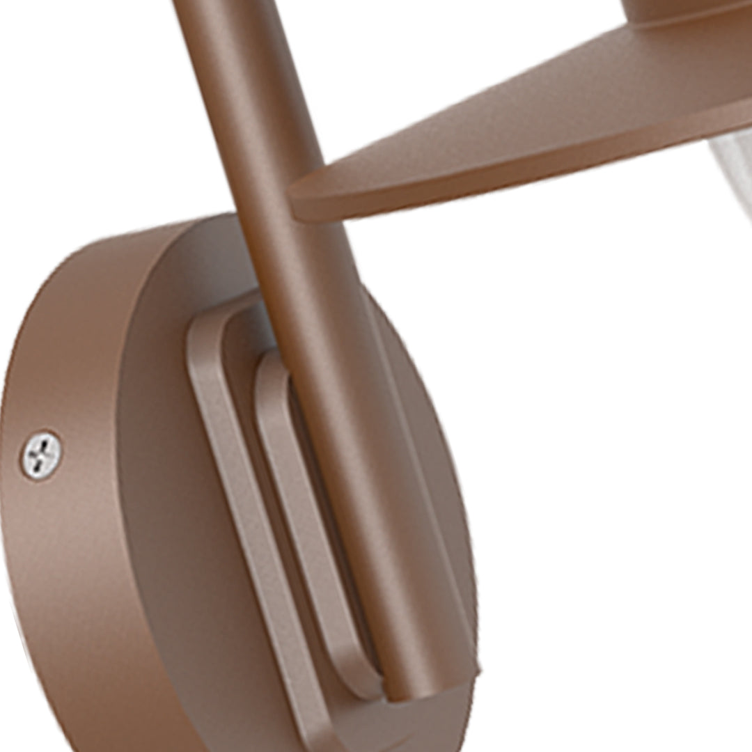 Contemporary wall sconce casting warm downward light on textured stone wall surface