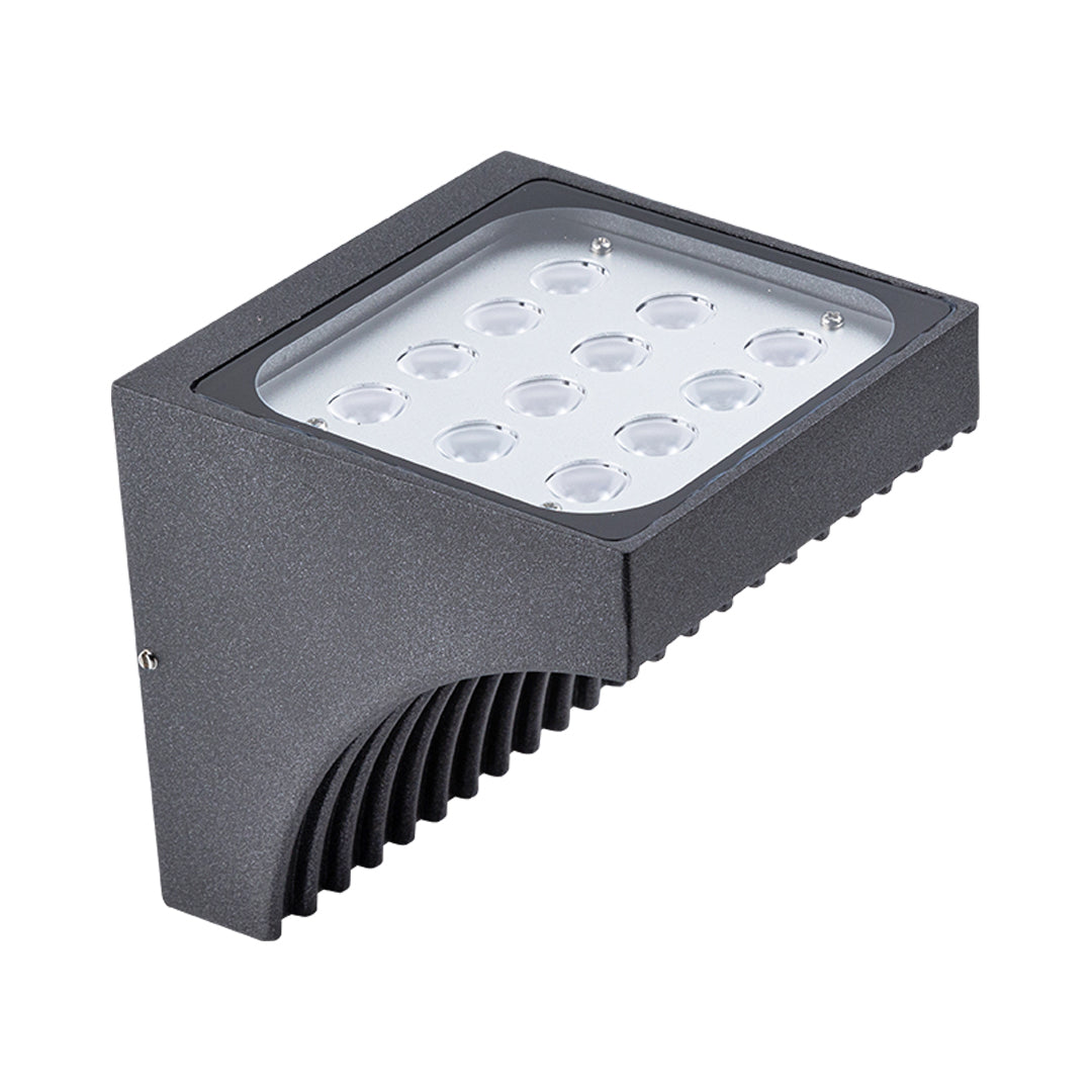 Close-up view of bronze outdoor light fixture showing curved arm and mounting details