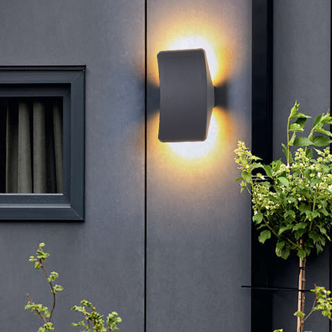 Sleek gray geometric wall light with angular design and modern architectural styling