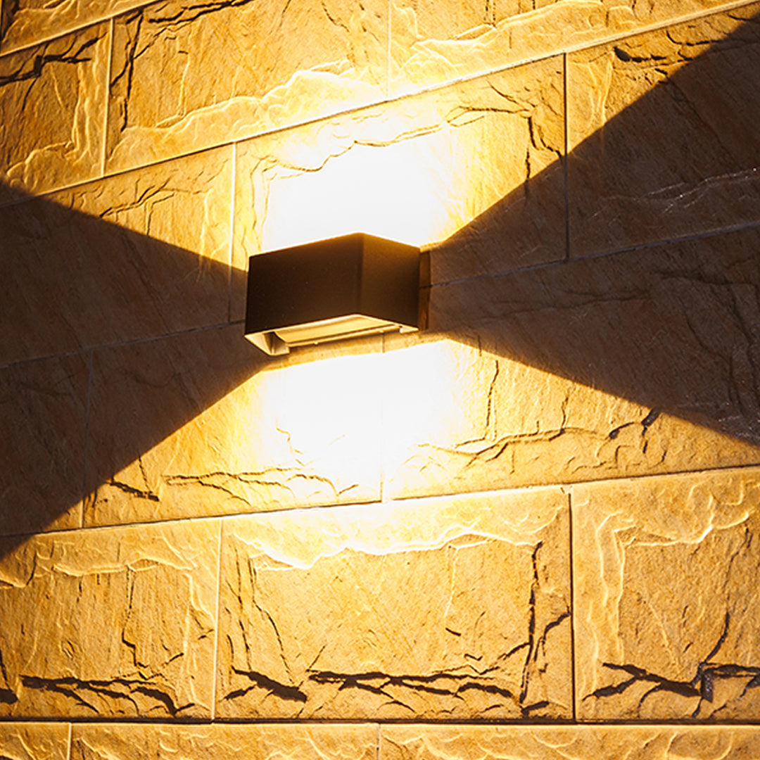 Modern black rectangular LED wall light with integrated sensor and sleek minimalist design