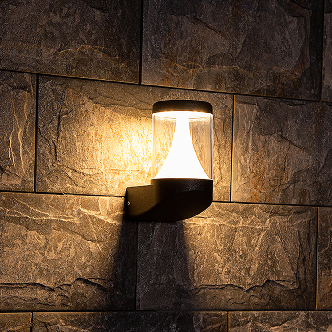 Round black recessed light fixture with visible LED module and chrome accents