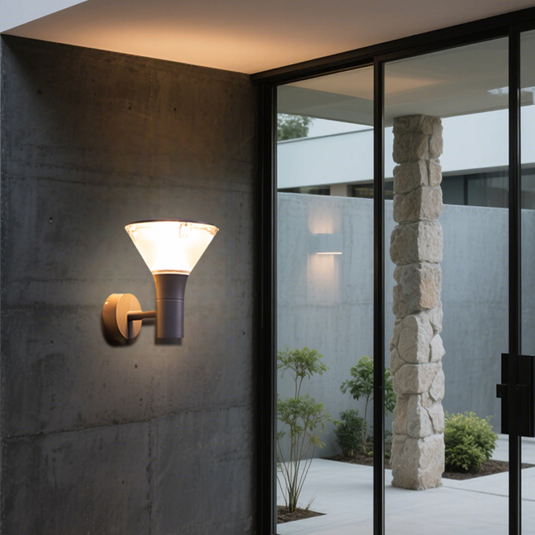 Industrial-style black cylindrical outdoor light fixture with robust weather-resistant construction