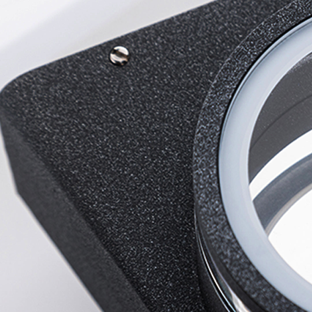 Sleek black angular wall light fixture with modern minimalist aesthetic