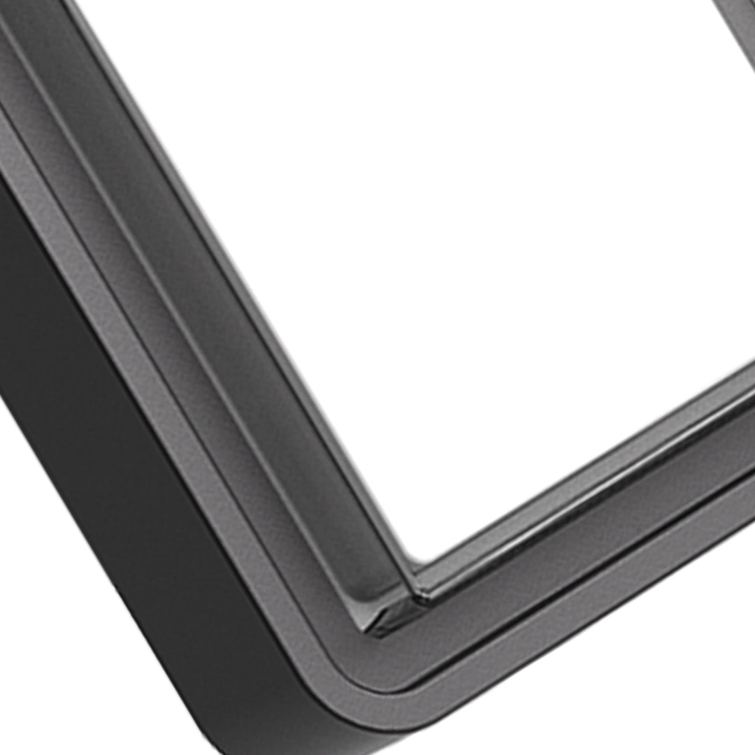 Outdoor wall light with angled black housing and directional beam capabilities