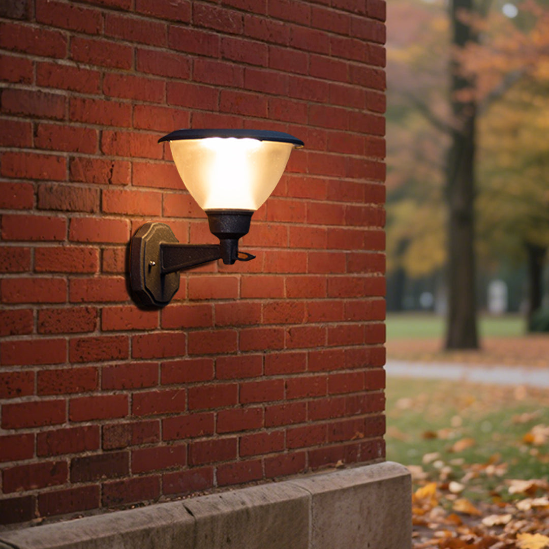 Warm LED wall light illuminating textured brick surface creating dramatic architectural lighting effects