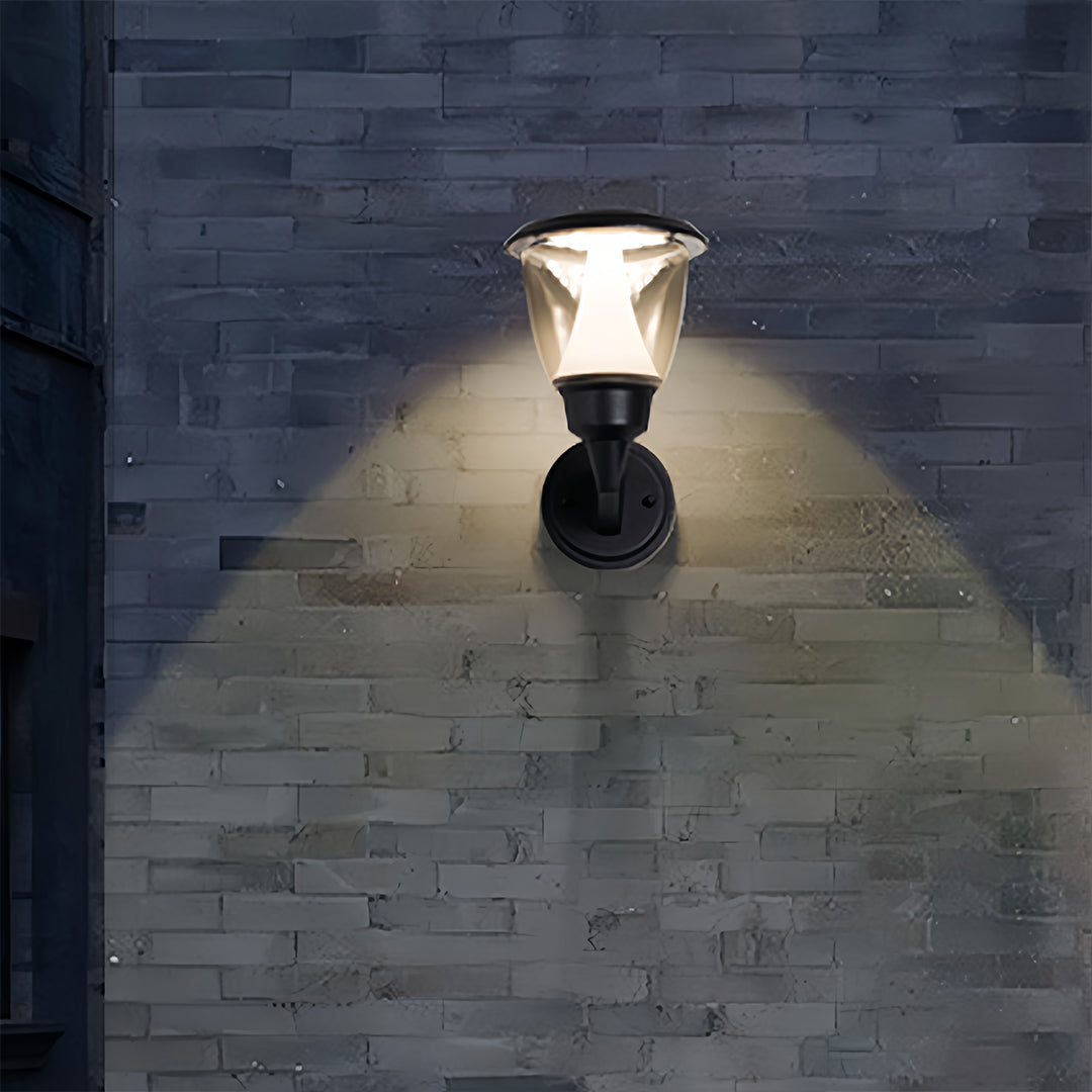 Warm LED wall light illuminating textured brick surface creating dramatic architectural lighting effects