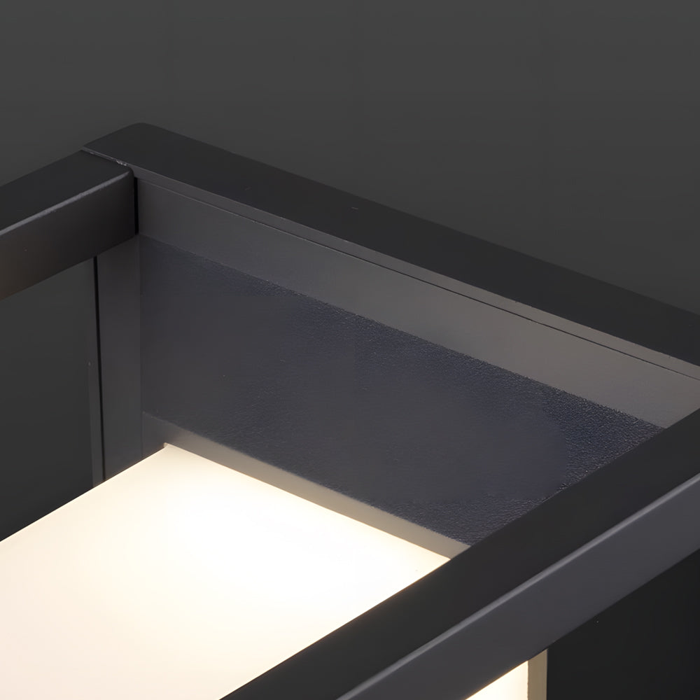 Minimalist LED wall light casting clean downward beam on dark architectural surface