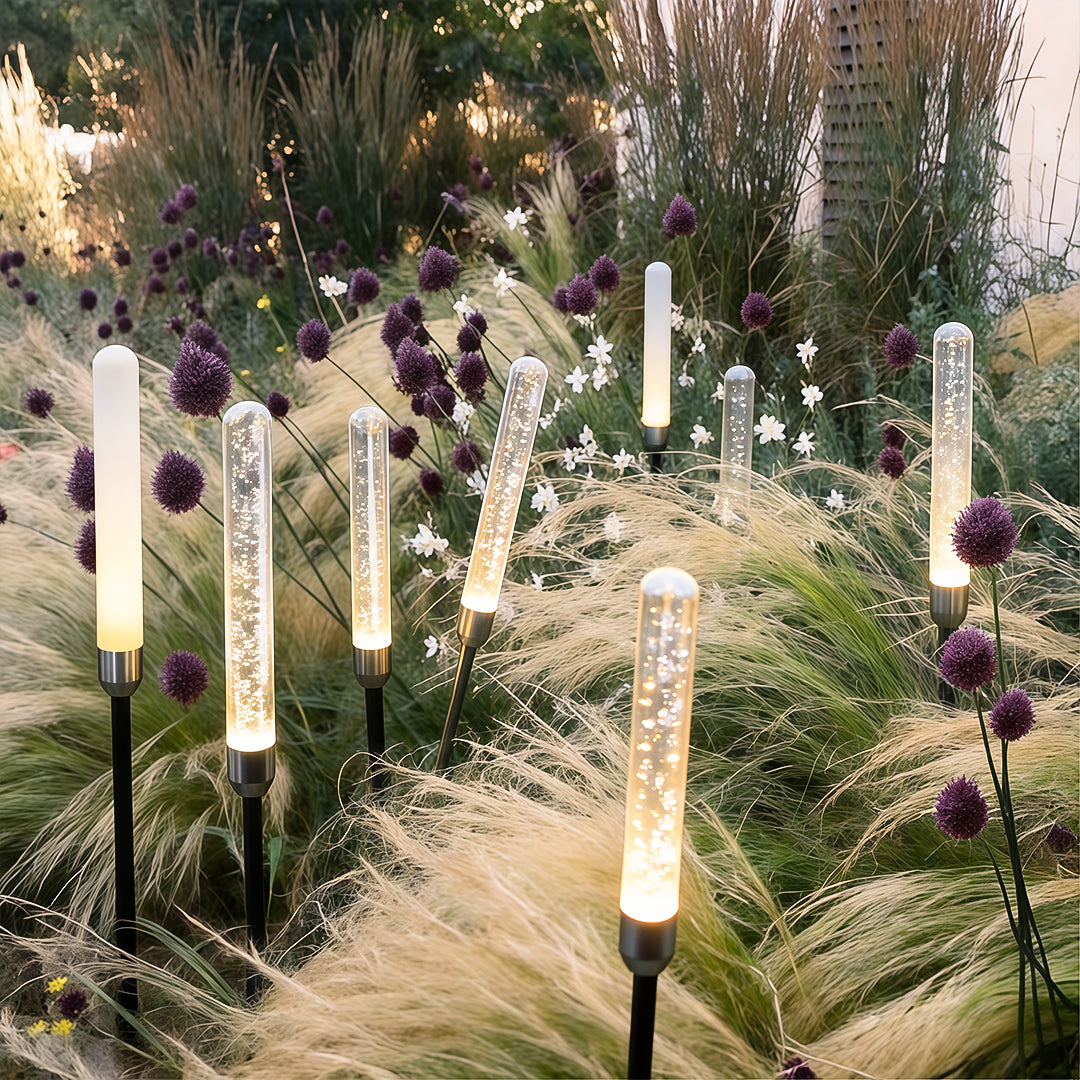 Acrylic bubble landscape light enhancing a contemporary outdoor garden with elegant light.