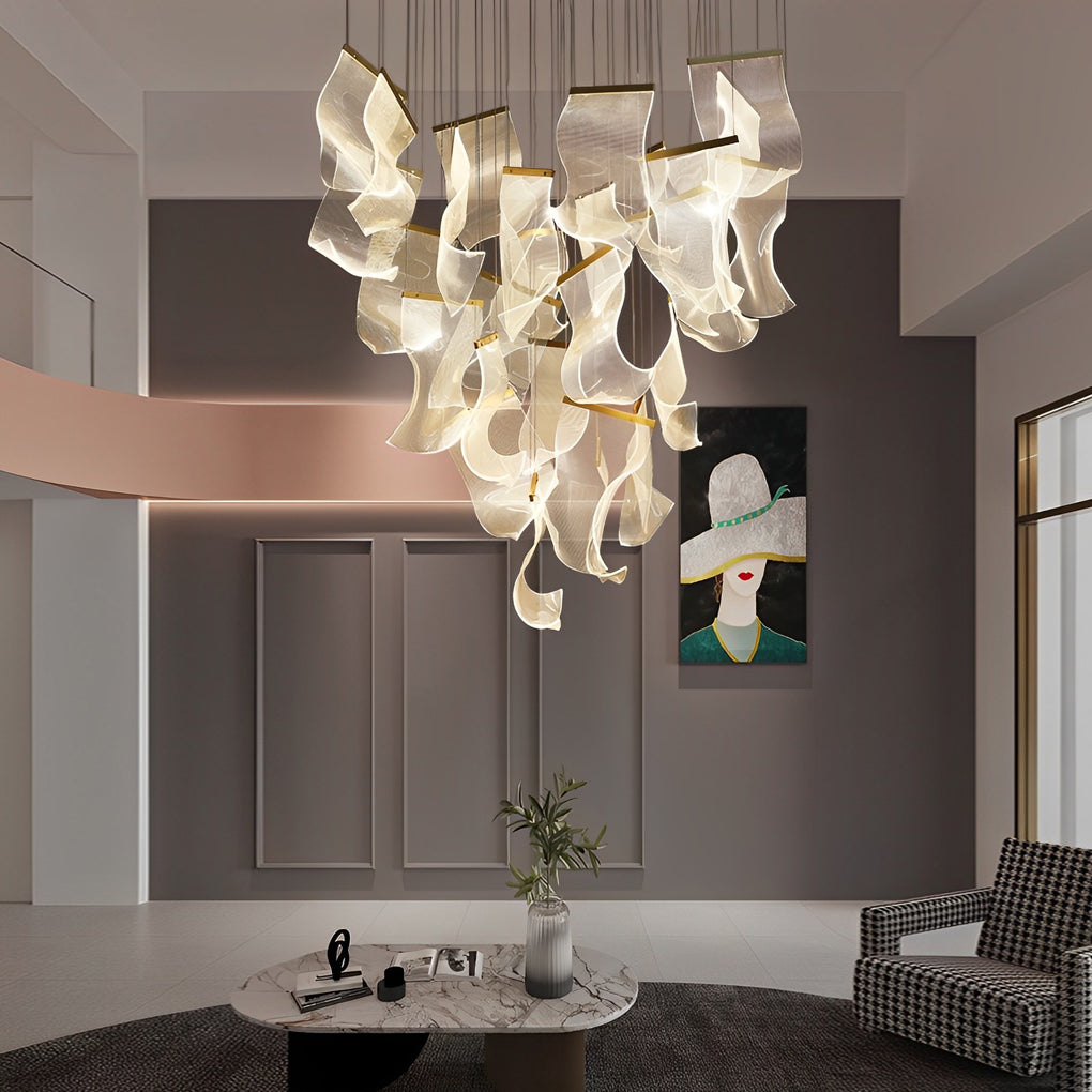 Acrylic chandeliers with a sleek design, enhancing a stylish living room.