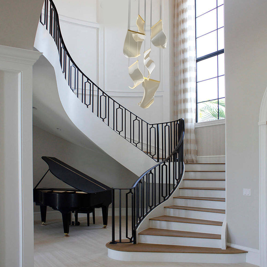 Acrylic chandeliers providing soft lighting in a stylish living room.