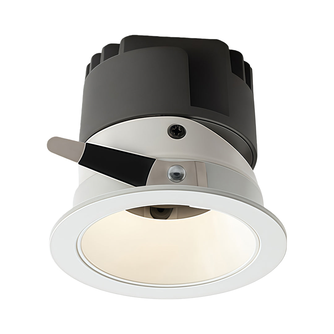 Adjustable interior spotlights featuring white bezel and glass shade chandelier style tilting mechanism for flexible illumination.