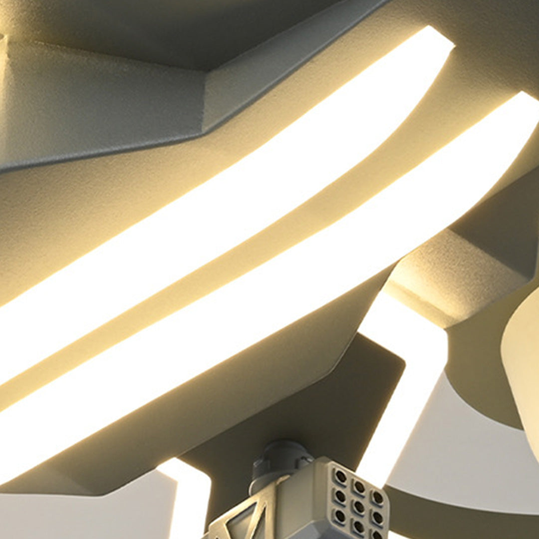 Detail view of kids ceiling fan with light showing adjustable blade mechanism and warm lighting