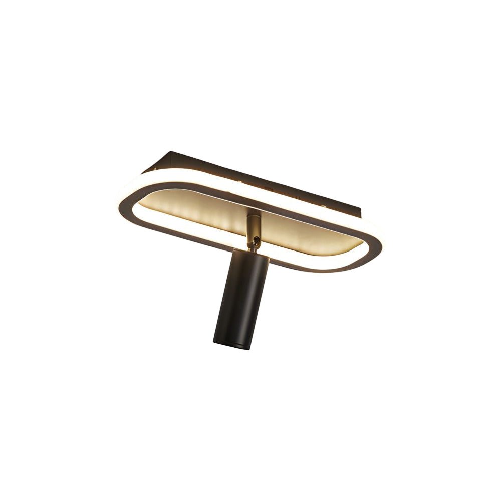 Black adjustable LED ceiling spotlight with a sleek design, ideal for focused lighting in a contemporary interior.