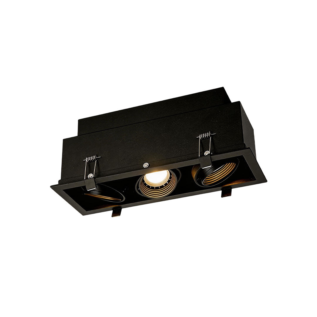 Black recessed led spotlight indoor with adjustable modules for directional room lighting.