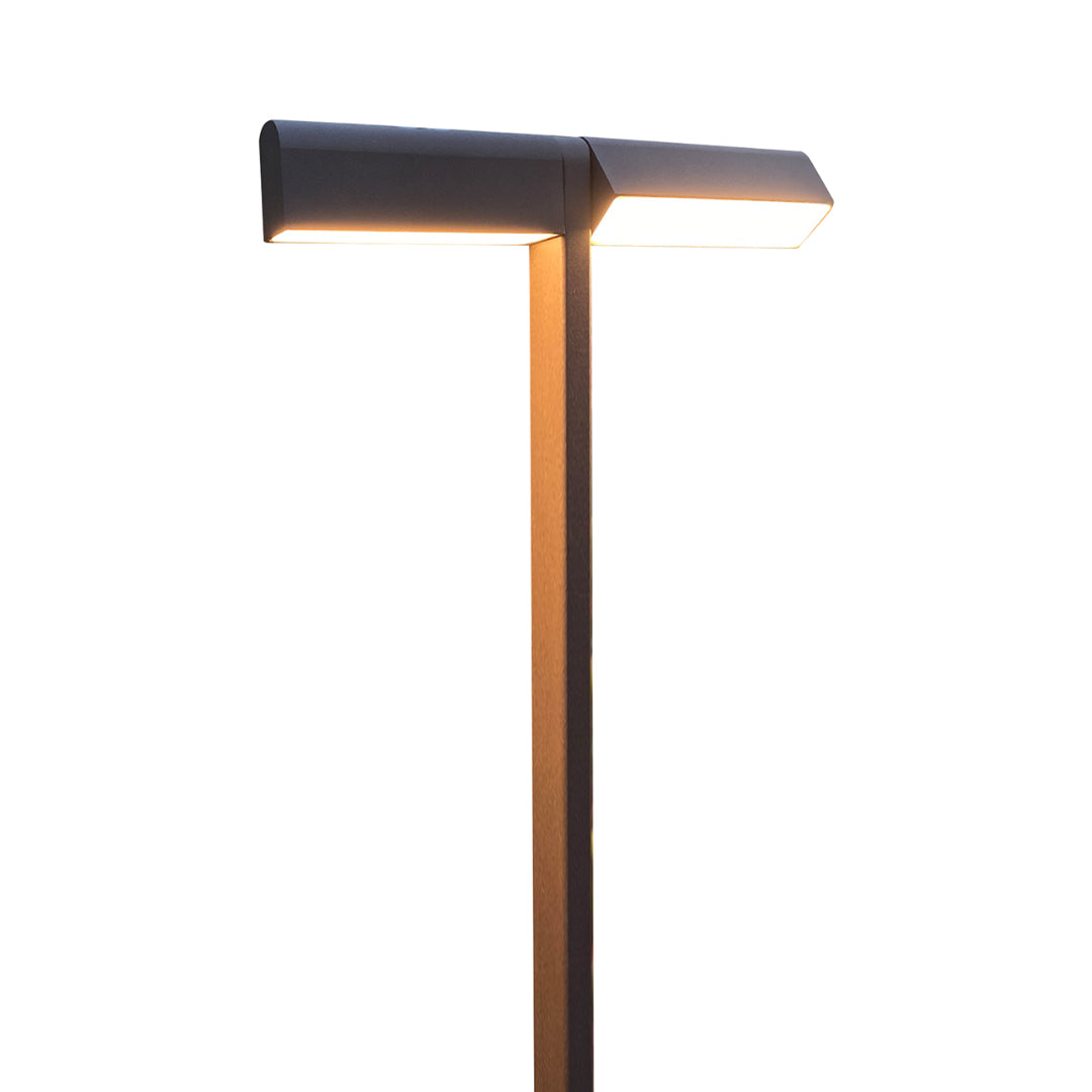 Modern aluminum pathway stake with downward-facing head, providing soft glow ideal for led pathway lighting.