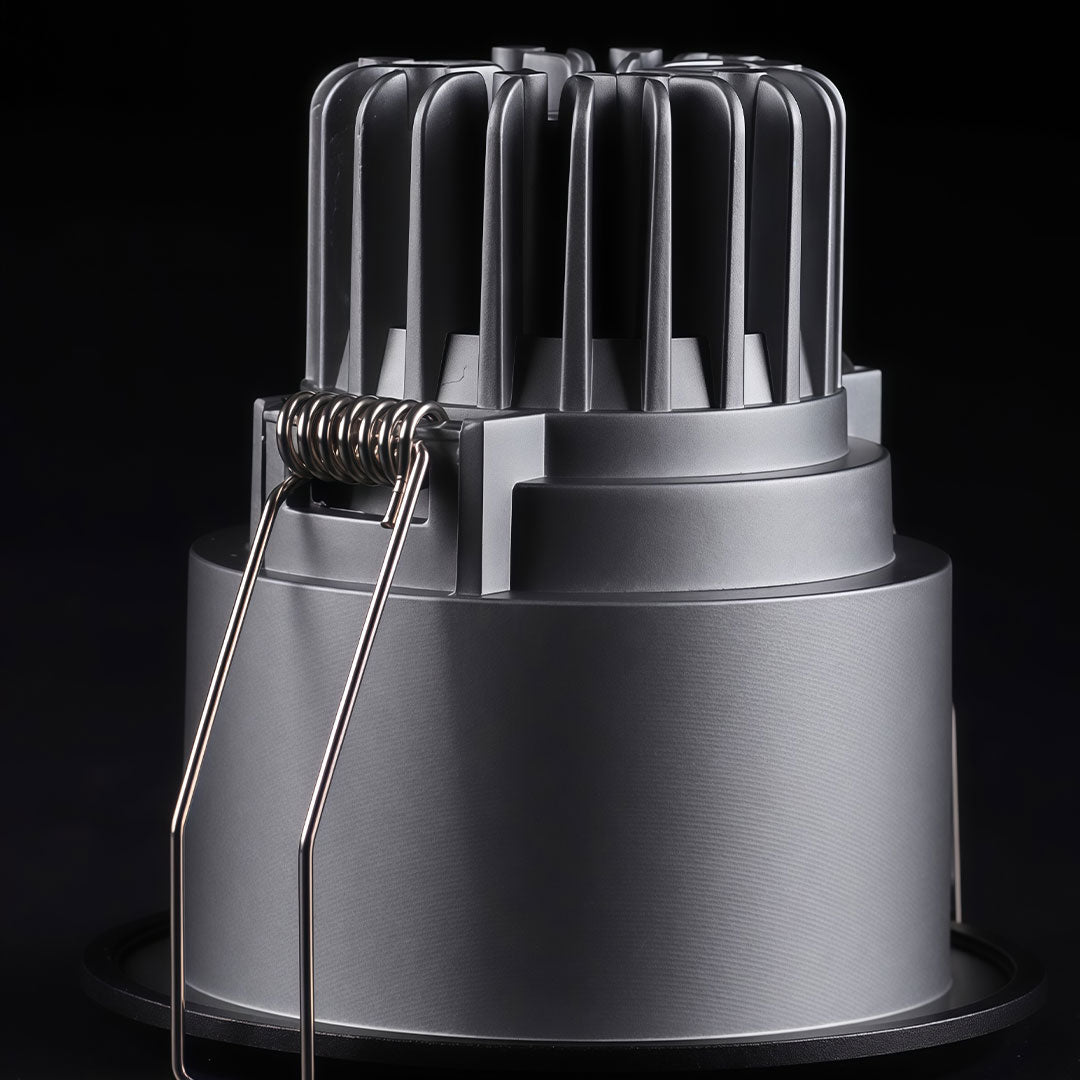 Deep-set recessed ceiling spotlights with a heavy-duty aluminum heat sink and spring clips.