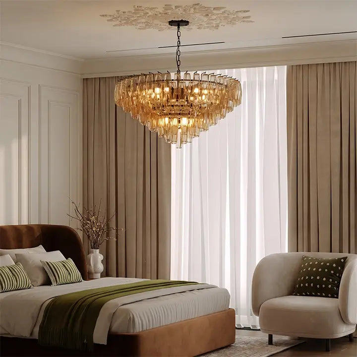 Amber crystal chandelier in an elegant modern bedroom