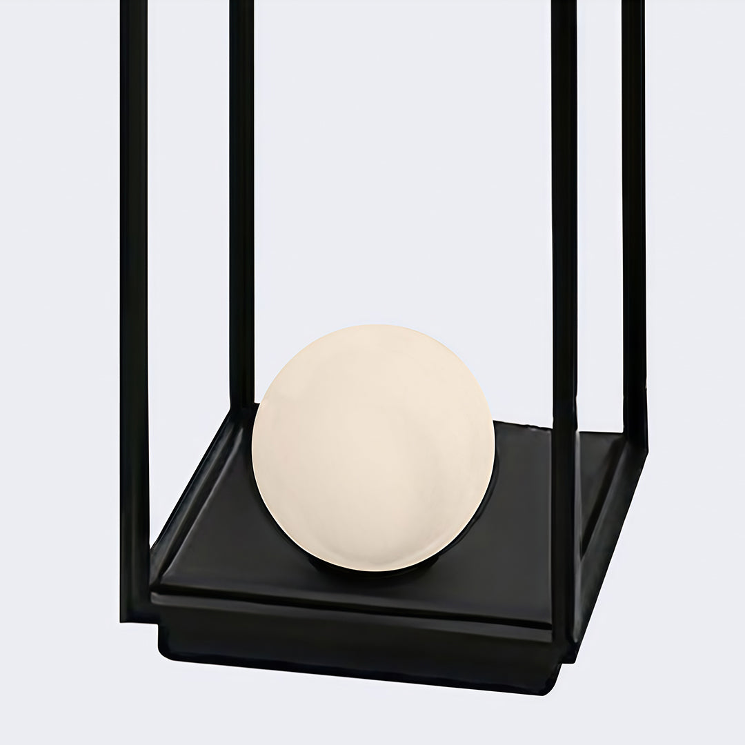 Multiple bollard outdoor lights providing ambient lighting, enhancing the beauty of the landscape with their modern design.