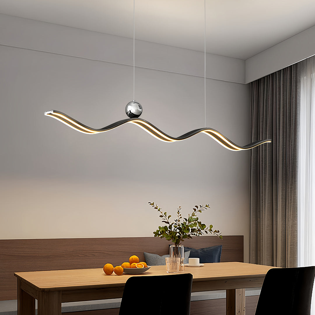 Ambient lighting from the stylish linear led pendant light fixture, creating a warm and welcoming dining area atmosphere.