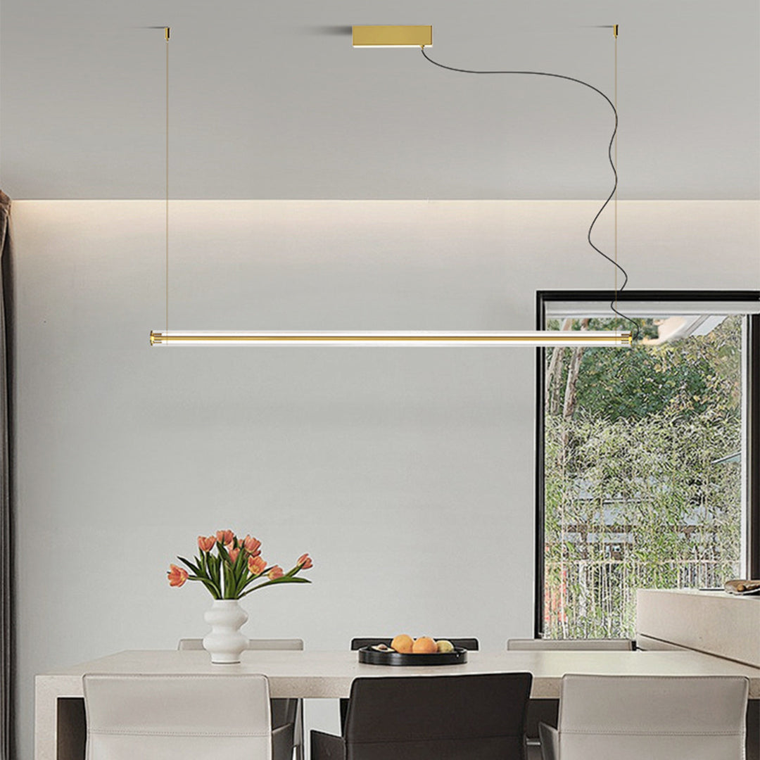 Sophisticated linear pendant light creating ambient lighting in modern dining room setting