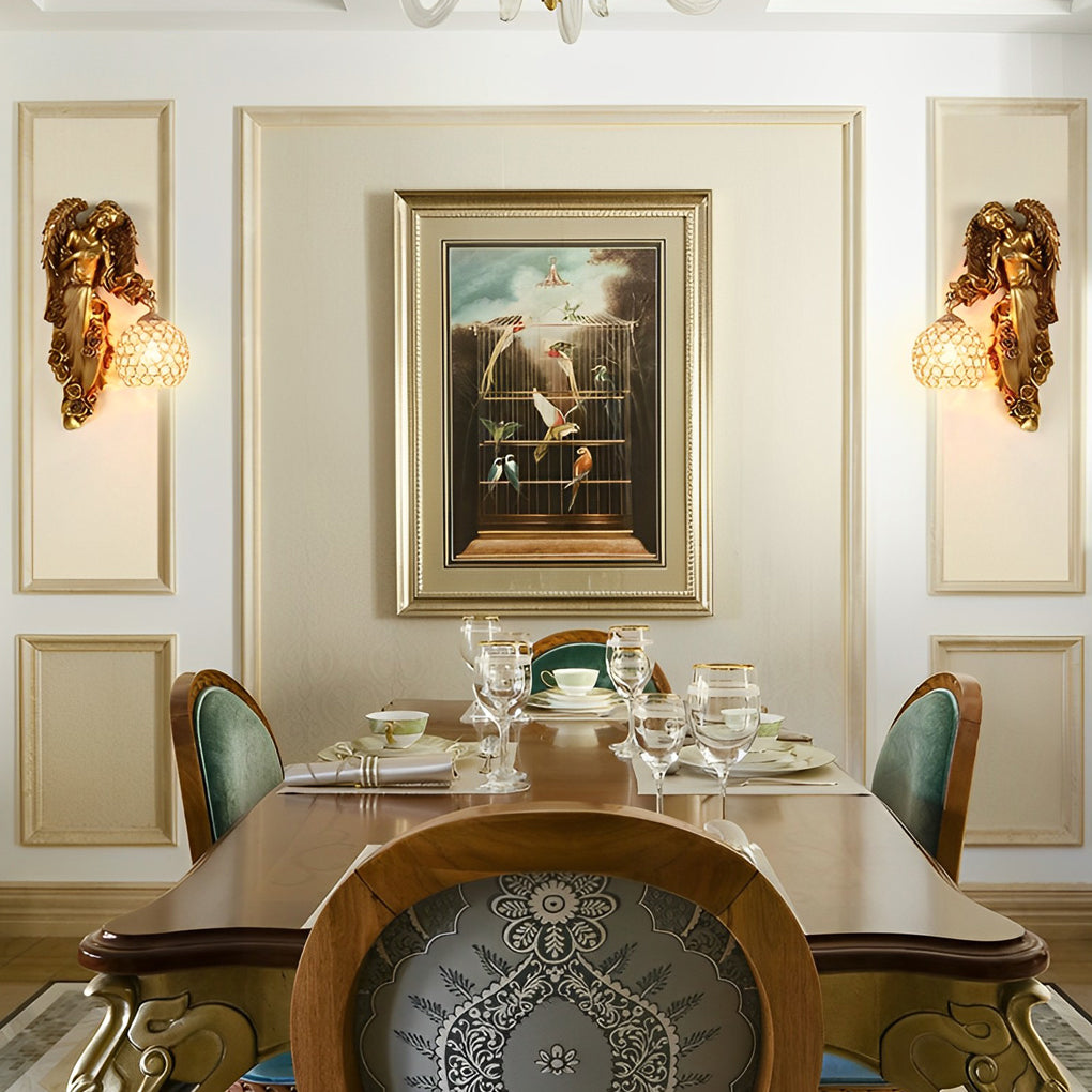 Classic dining room interior with symmetrical angel wall sconces and crystal globe lighting.