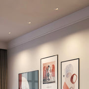 Angled adjustable spotlights featuring white bezel and glass shade chandelier inspired black reflector cone.