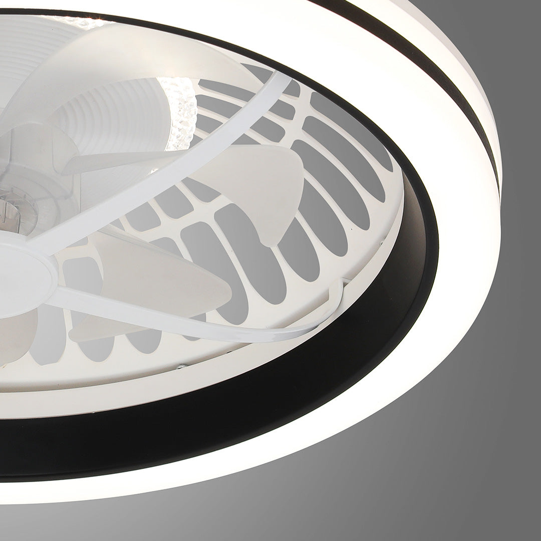 Angled detail of the bright LED outer ring and decorative inner frame of the white flush mount ceiling fan with light. 