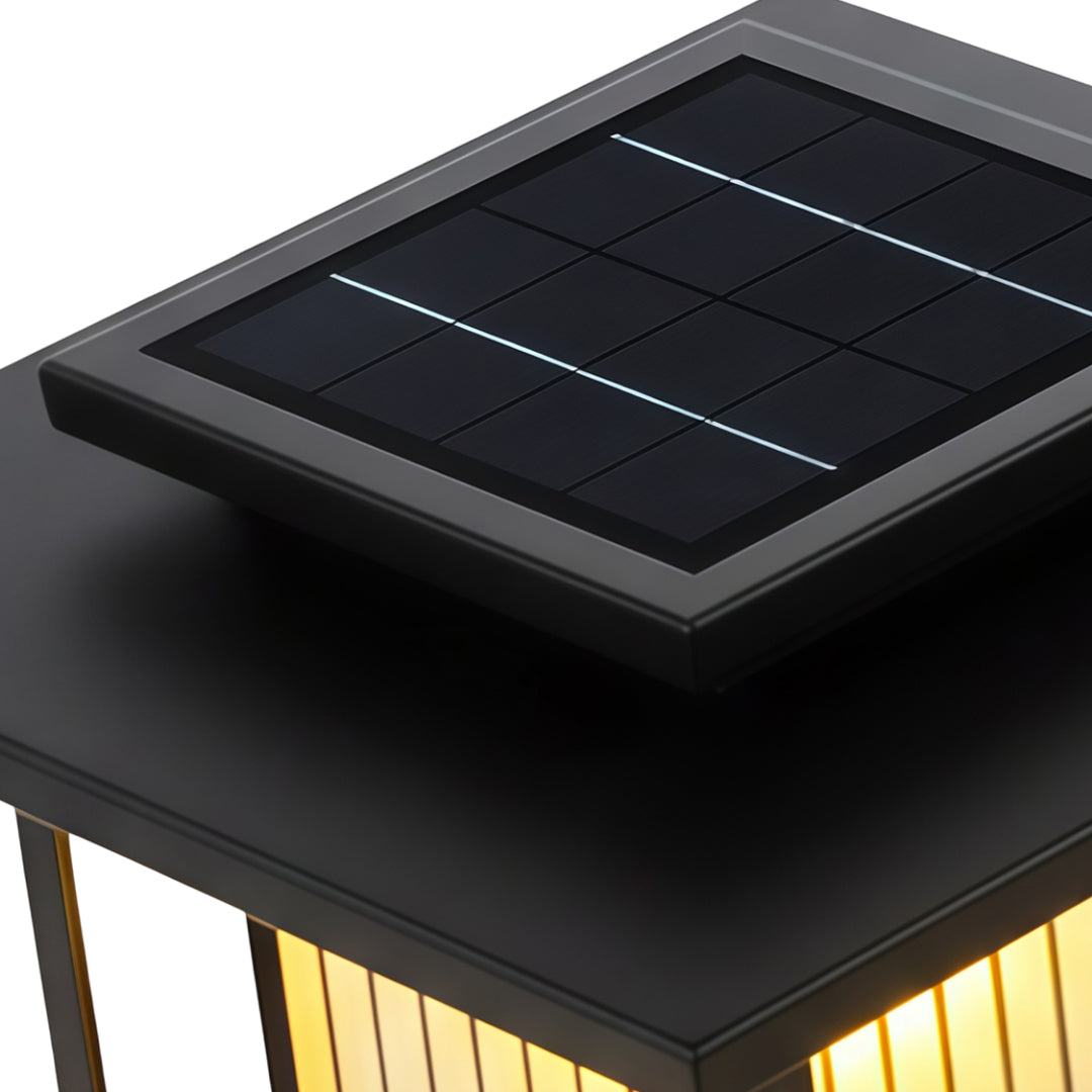 Angled close-up of driveway pillar solar lights showing integrated solar top and LED diffuser.