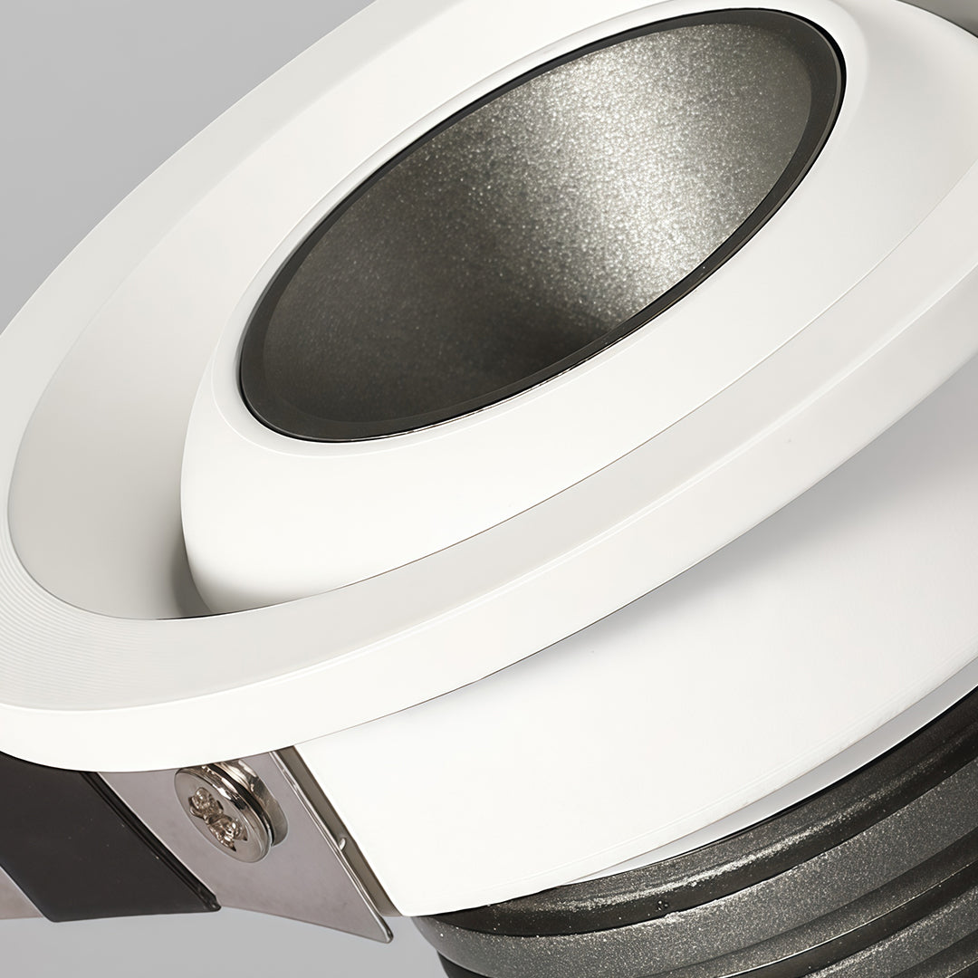 Angled view of mini LED spotlight with white housing and adjustable tilt mechanism