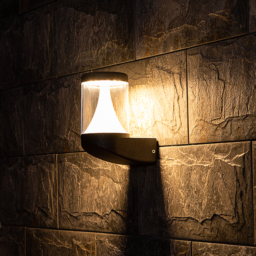 Modern black curved outdoor wall light with integrated LED and sleek geometric design